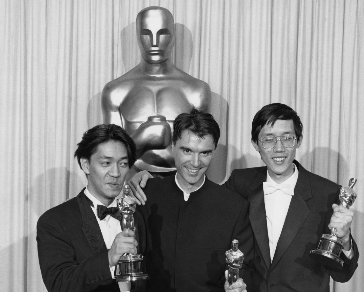 Ryuichi Sakamoto, David Byrne and Cong Su accept their Oscars for Best Original Score.